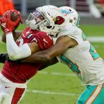 Arizona Cardinals wide receiver Christian Kirk pulls in a catch as Miami Dolphins cornerback Byron Jones, right, defends during the second half of an NFL football game, Sunday, Nov. 8, 2020, in Glendale, Ariz. (AP Photo/Rick Scuteri)