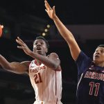 FILE - In this Thursday, Feb. 27, 2020, file photo, Southern California forward Onyeka Okongwu, left, shoots as Arizona forward Ira Lee defends during the first half of an NCAA college basketball game in Los Angeles. Okongwu is a considered a potential lottery pick in the NBA draft, on Wednesday, Nov. 18, 2020. (AP Photo/Mark J. Terrill, File)