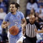 FILE - In this March 11, 2020, file photo, North Carolina guard Cole Anthony (2) dribbles against Syracuse during the first half of an NCAA college basketball game at the Atlantic Coast Conference tournament in Greensboro, N.C. Anthony is considered a first-round prospect and one of the top point guards in the NBA draft on Nov. 18. (AP Photo/Ben McKeown, File)
