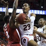 FILE - In this Wednesday, Feb. 12, 2020, file photo, Auburn forward Isaac Okoro (23) shoots over Alabama forward Javian Davis (0) during the second half of an NCAA college basketball game, in Auburn, Ala. Okoro is considered a lottery prospect in the NBA draft on Nov. 18, 2020. (AP Photo/Julie Bennett, File)