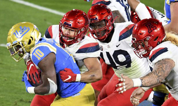 UCLA running back Demetric Felton carries against Arizona during the first half of an NCAA college ...