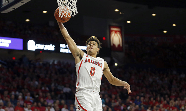 Arizona guard Josh Green (0) scores against San Jose State during the second half during an NCAA co...
