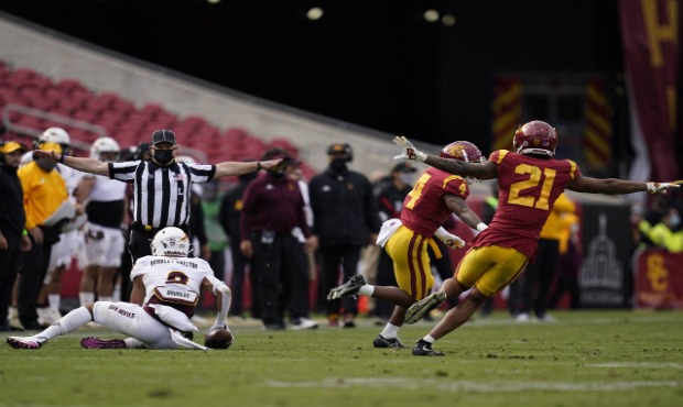 Southern California safety Isaiah Pola-Mao (21) and safety Max Williams (4) celebrate after an inco...