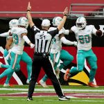 Miami Dolphins defensive end Shaq Lawson (90) celebrates his fumble recovery for a touchdown against the Arizona Cardinals during the first half of an NFL football game, Sunday, Nov. 8, 2020, in Glendale, Ariz. (AP Photo/Rick Scuteri)