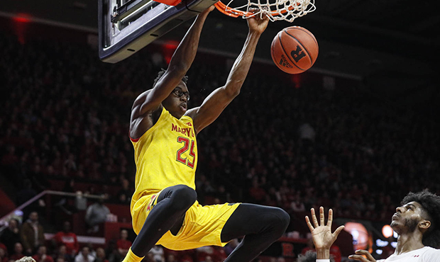 FILE - In this Tuesday, March 3, 2020, file photo, Maryland's Jalen Smith (25) dunks as Rutgers' My...