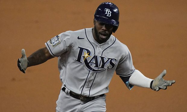 Tampa Bay Rays' Randy Arozarena celebrates a home run during the first inning in Game 6 of the base...