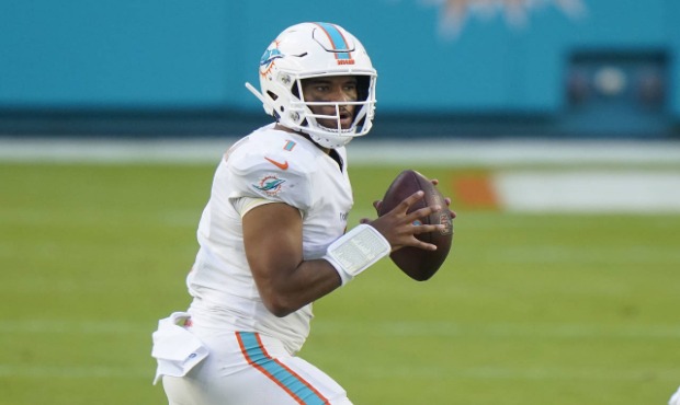 Miami Dolphins quarterback Tua Tagovailoa (1) looks to pass the ball during the second half of an N...