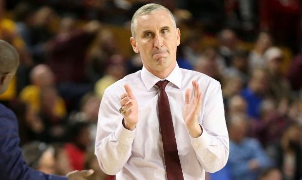 Arizona State coach Bobby Hurley applauds the team's lead against UCLA during the second half of an...