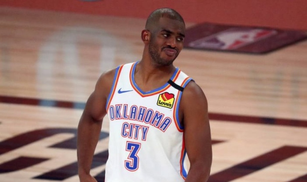 Oklahoma City Thunder guard Chris Paul (3) reacts during the second half of Game 4 of an NBA basket...