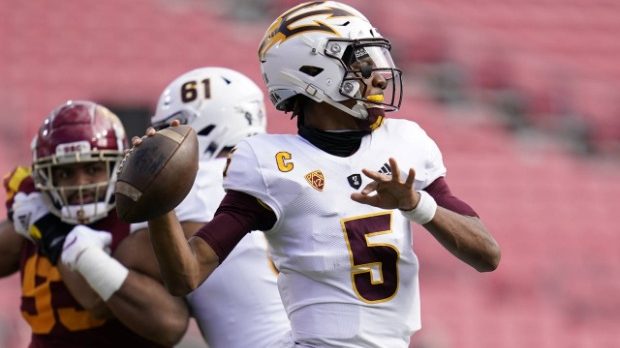 Arizona State quarterback Jayden Daniels (5) throws a pass against Southern California during the f...