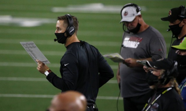 Arizona Cardinals head coach Kliff Kingsbury watches play against the Dallas Cowboys in the second ...
