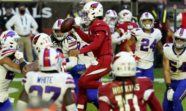 Arizona Cardinals quarterback Kyler Murray, center, scores a rushing touchdown against the Buffalo ...