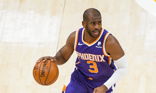 Chris Paul #3 of the Phoenix Suns controls the ball during a game against the Utah Jazz at Vivint S...