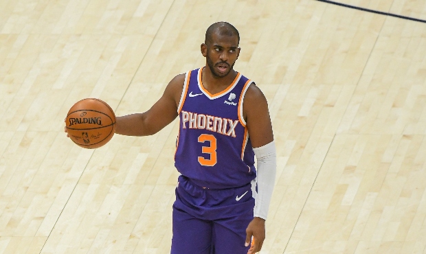 Chris Paul # of the Phoenix Suns controls the ball during a game against the Utah Jazz at Vivint Sm...