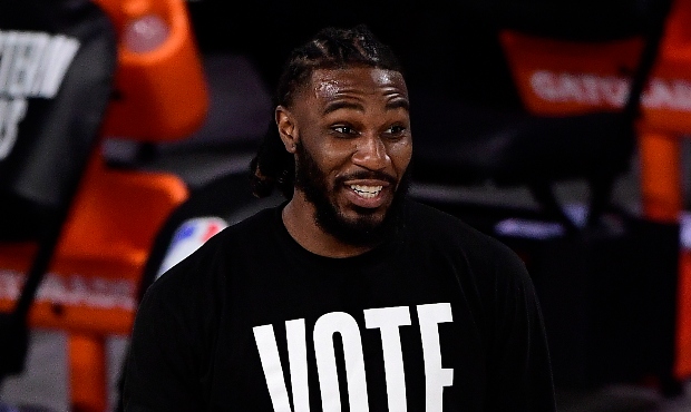 Jae Crowder #99 of the Miami Heat wears a VOTE shirt during warm-up prior to the game against the B...
