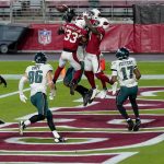 Arizona Cardinals cornerback Byron Murphy (33), free safety Chris Banjo, right, break up a Philadelphia Eagles final pass attempt with no time on the clock during the second half of an NFL football game, Sunday, Dec. 20, 2020, in Glendale, Ariz. The Cardinals won 33-26. (AP Photo/Ross D. Franklin)