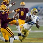 UCLA wide receiver Delon Hurt (29) pulls in a first down catch as Arizona State defensive back DeAndre Pierce, left, defends during the first half of an NCAA college football game, Saturday, Dec. 5, 2020, in Tempe, Ariz. (AP Photo/Matt York)