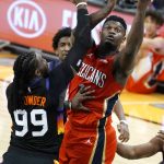 New Orleans Pelicans forward Zion Williamson shoots over Phoenix Suns forward Jae Crowder (99) during the first half of an NBA basketball game Tuesday, Dec. 29, 2020, in Phoenix. (AP Photo/Rick Scuteri)