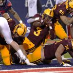 Arizona State running back Rachaad White (3) scores a touchdown against Arizona in the second half during an NCAA college football game, Friday, Dec. 11, 2020, in Tucson, Ariz. (AP Photo/Rick Scuteri)