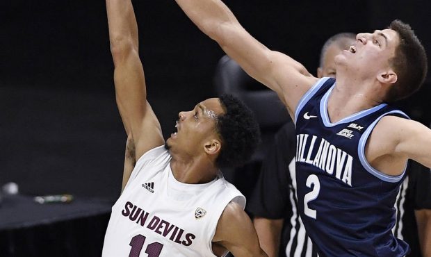 Arizona State's Alonzo Verge Jr., left, shoots as Villanova's Collin Gillespie defends in the first...