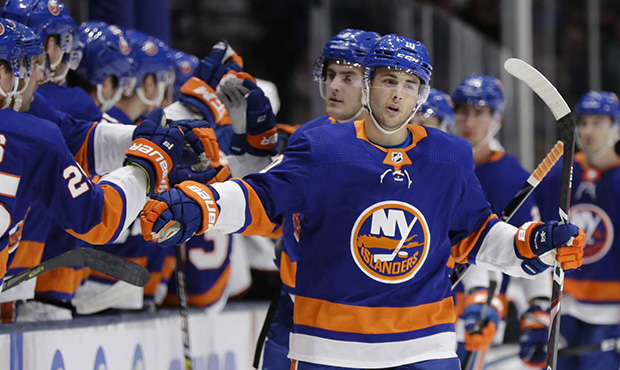 New York Islanders' Derick Brassard (10) celebrates with teammates after scoring a goal during the ...