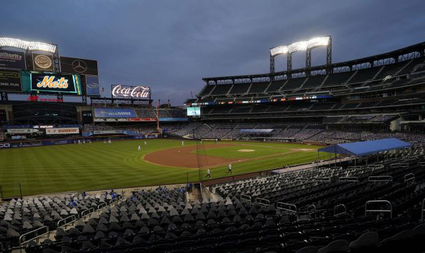 FILE - In this Sept. 9, 2020, file photo, Citi Field is viewed at dusk before a baseball game betwe...