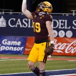 Arizona State wide receiver Ricky Pearsall celebrates after scoring a touchdown against Arizona in the first half of an NCAA college football game, Friday, Dec. 11, 2020, in Tucson, Ariz. (AP Photo/Rick Scuteri)