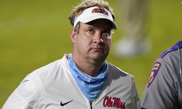 Mississippi coach Lane Kiffin looks up as he leaves the field following an NCAA college football ga...