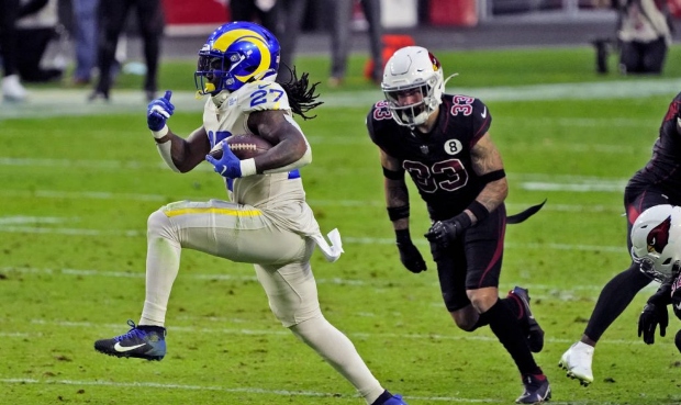 Los Angeles Rams running back Darrell Henderson (27) breaks free for a touchdown as Arizona Cardina...