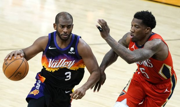 Phoenix Suns guard Chris Paul (3) drives on New Orleans Pelicans guard Eric Bledsoe during the seco...