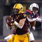 Arizona State linebacker Kyle Soelle (34) intercepts a pass intended for Arizona wide receiver Tre Adams during the first half of an NCAA college football game Friday, Dec. 11, 2020, in Tucson, Ariz. (AP Photo/Rick Scuteri)