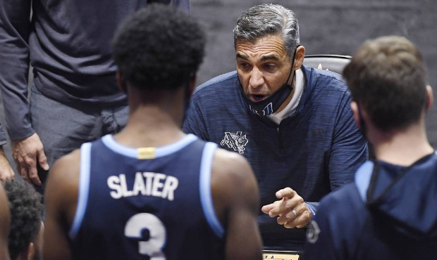 Villanova coach Jay Wright talks to the team during the second half of an NCAA college basketball g...