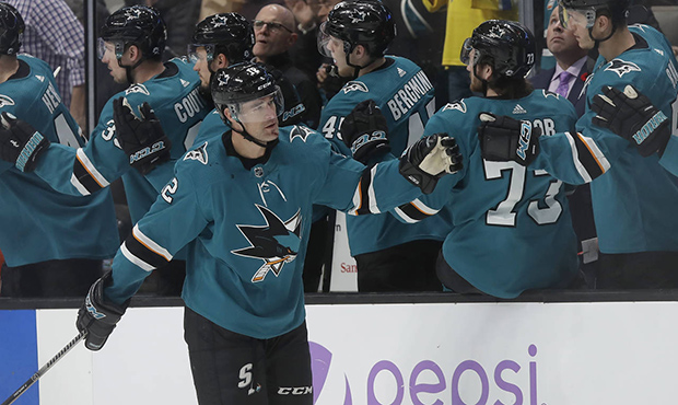 FILE - In this Nov. 5, 2019, file photo, San Jose Sharks center Patrick Marleau, foreground, is con...