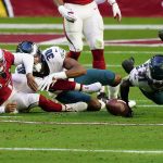 Arizona Cardinals quarterback Kyler Murray (1) fumbles the ball as Philadelphia Eagles cornerback Nickell Robey-Coleman (31) makes the recovery during the first half of an NFL football game, Sunday, Dec. 20, 2020, in Glendale, Ariz. (AP Photo/Rick Scuteri)