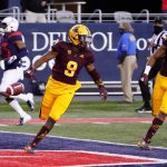 Arizona State's D.J. Taylor (9) scores a touchdown against Arizona on a kick return during the first half of an NCAA college football game Friday, Dec. 11, 2020, in Tucson, Ariz. (AP Photo/Rick Scuteri)