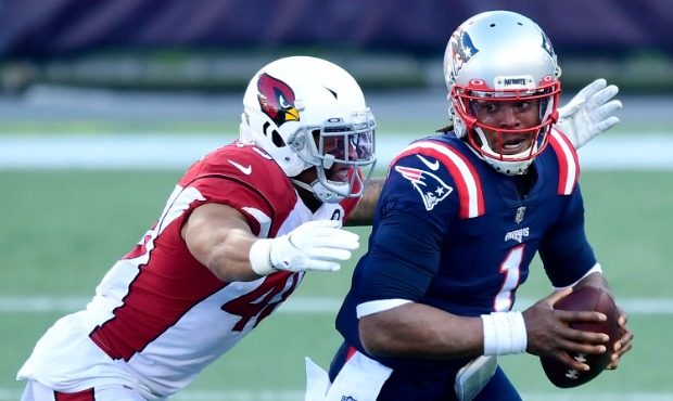 Isaiah Simmons #48 of the Arizona Cardinals sacks Cam Newton #1 of the New England Patriots during ...