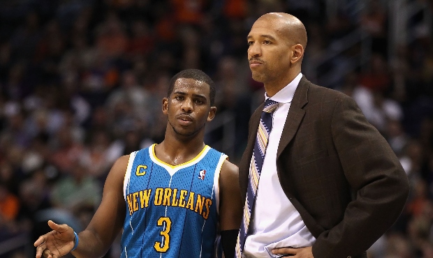 Chris Paul #3 of the New Orleans Hornets talks with head coach Monty Williams during the NBA game a...
