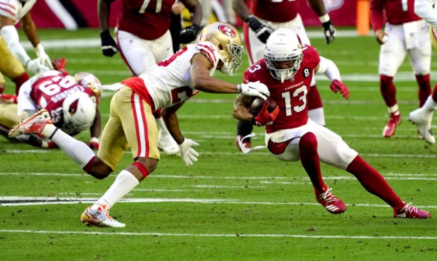 Arizona Cardinals wide receiver Christian Kirk (13) runs after the catch as San Francisco 49ers cor...