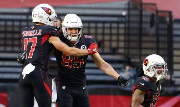Tight end Dan Arnold #85 of the Arizona Cardinals celebrates with wide receiver Andy Isabella #17 a...