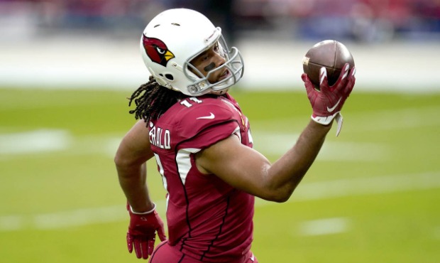 Arizona Cardinals wide receiver Larry Fitzgerald (11) warms up prior to an NFL football game agains...