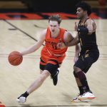 Oregon State's Zach Reichle (11) drives past Arizona State's Remy Martin (1) during the second half of an NCAA college basketball game in Corvallis, Ore., Saturday, Jan. 16, 2021. Oregon State won 80-79. (AP Photo/Amanda Loman)