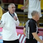 Arizona State coach Bobby Hurley, left, argues with a referee after a technical foul was called on the Arizona State bench during the second half of the team's NCAA college basketball game Southern California on Saturday, Jan. 9, 2021, in Tempe, Ariz. USC won 73-64. (AP Photo/Ross D. Franklin)