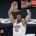 Los Angeles Clippers center Ivica Zubac (40) dunks against the Phoenix Suns during the first half of an NBA basketball game Sunday, Jan. 3, 2021, in Phoenix. (AP Photo/Ralph Freso)