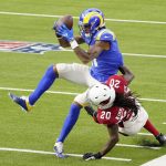 Los Angeles Rams wide receiver Josh Reynolds (11) catches a pass against Arizona Cardinals cornerback Dre Kirkpatrick (20) during the first half of an NFL football game in Inglewood, Calif., Sunday, Jan. 3, 2021. (AP Photo/Jae C. Hong)
