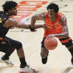 Oregon State's Gianni Hunt (0) drives past Arizona State's Remy Martin (1) during the first half of an NCAA college basketball game in Corvallis, Ore., Saturday, Jan. 16, 2021. (AP Photo/Amanda Loman)