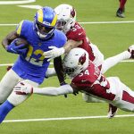 Los Angeles Rams wide receiver Van Jefferson (12) runs against Arizona Cardinals free safety Jalen Thompson (34) and cornerback Byron Murphy (33) during the second half of an NFL football game in Inglewood, Calif., Sunday, Jan. 3, 2021. (AP Photo/Jae C. Hong)