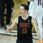 USC's Drew Peterson shouts as he celebrates a score by a teammate during the second half of an NCAA men's college basketball game against Arizona State Saturday, Jan. 9, 2021, in Tempe, Ariz. (AP Photo/Ross D. Franklin)