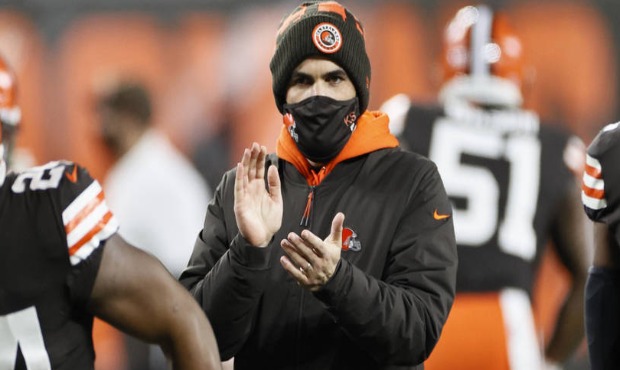 Cleveland Browns head coach Kevin Stefanski keeps watch before an NFL football game against the Bal...