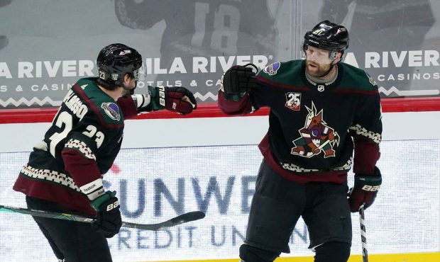 Arizona Coyotes right wing Phil Kessel, right, celebrates his goal against the San Jose Sharks with...