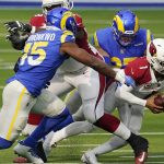 
              Arizona Cardinals quarterback Kyler Murray (1) is sacked by Los Angeles Rams defensive end Morgan Fox during the first half of an NFL football game Sunday, Jan. 3, 2021, in Inglewood, Calif. (AP Photo/Ashley Landis)
            